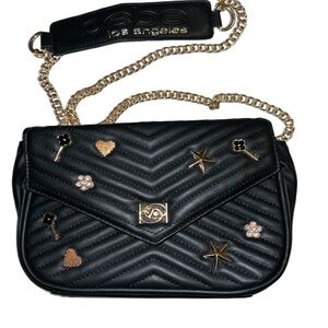 Black crossbody w/ charms .